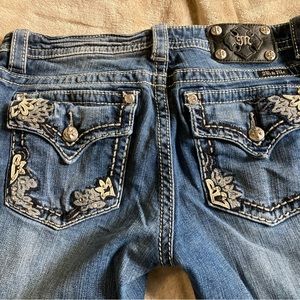 Miss Me jeans. Size 31, 3 pairs for $50. Two pairs inseam 34 and 1 pair capri.
